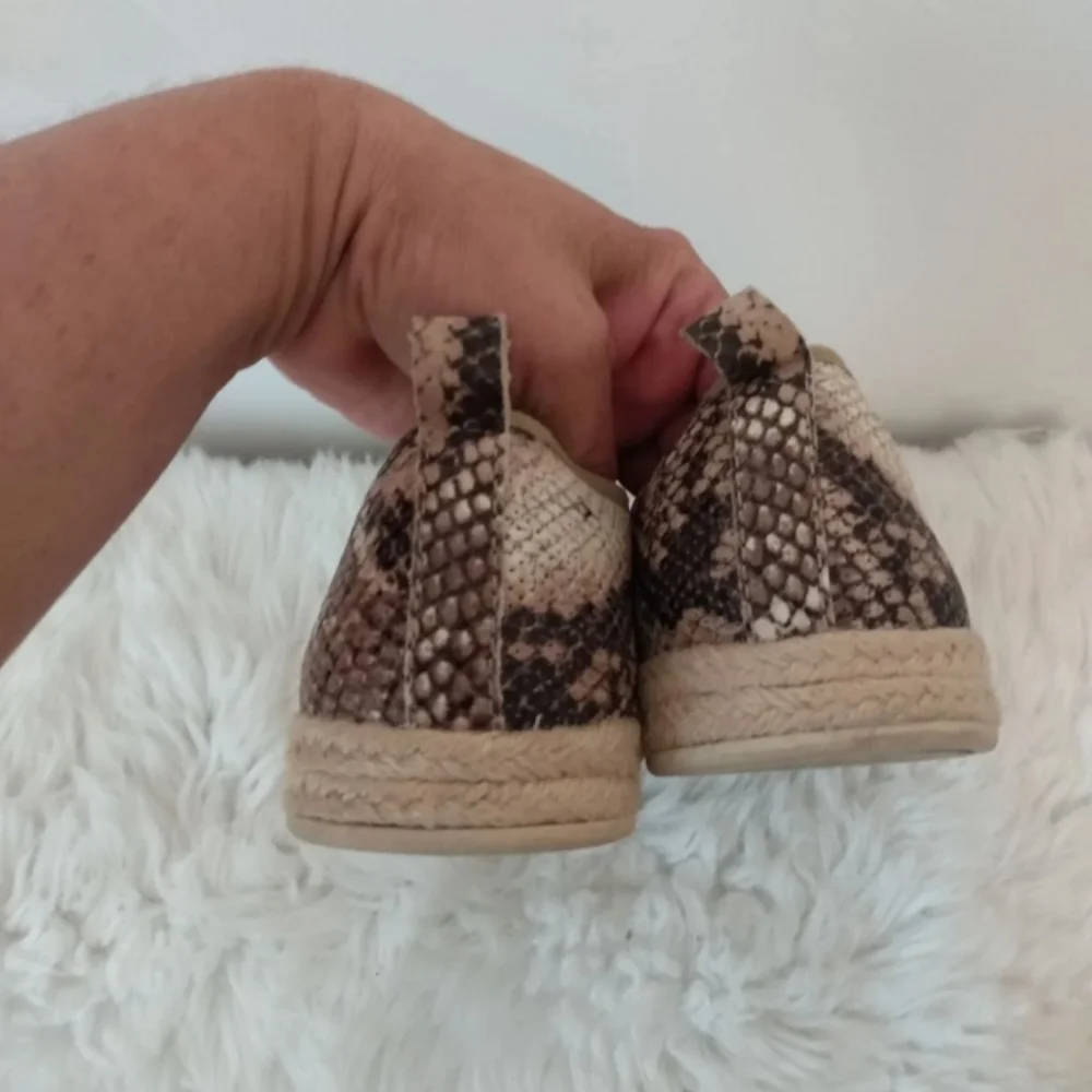 Clarks size 7 animal print slip on espadrilles. Comfort shoes.